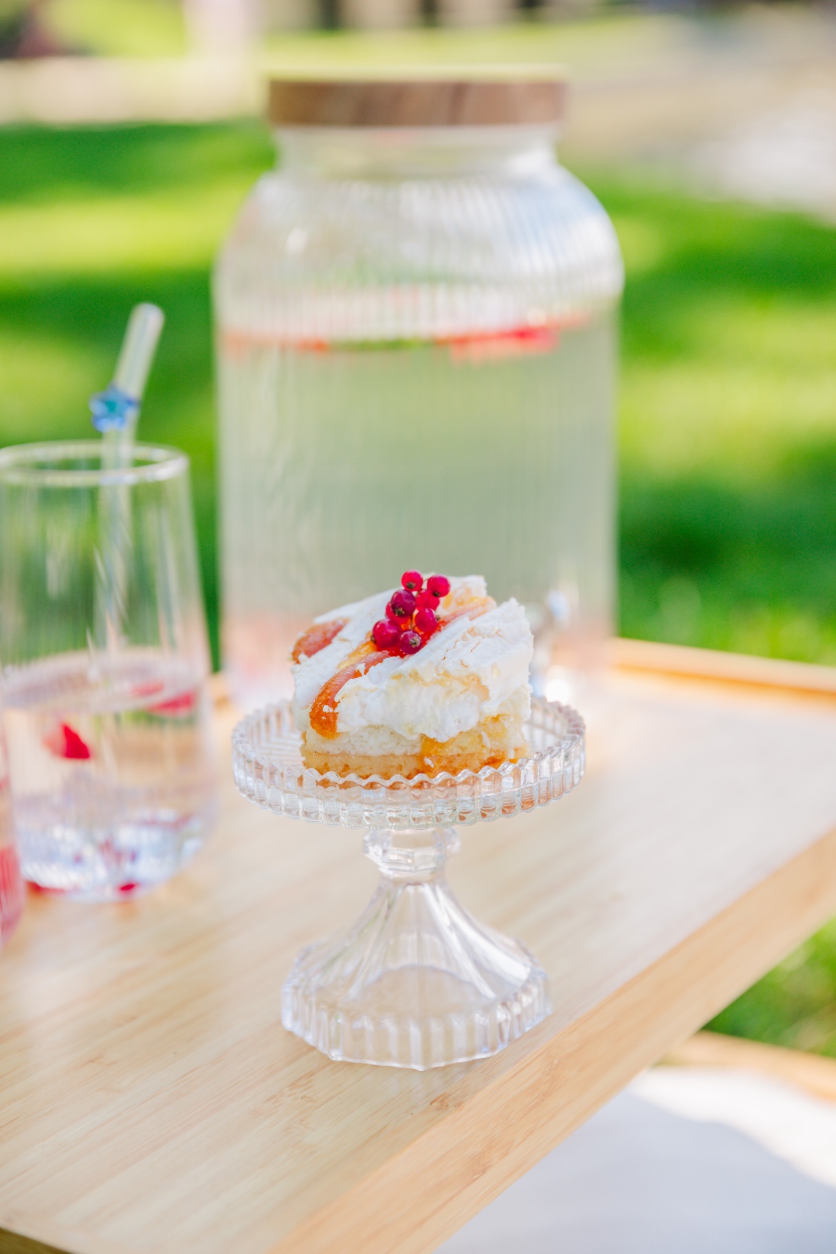 Luxury picnic Budapest dessert detail with lemon cake and infused water dispenser